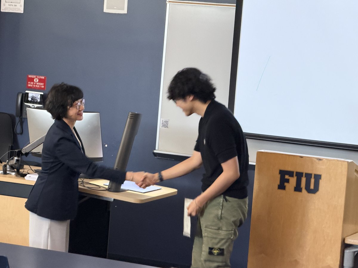 Zihao Wang receiving award