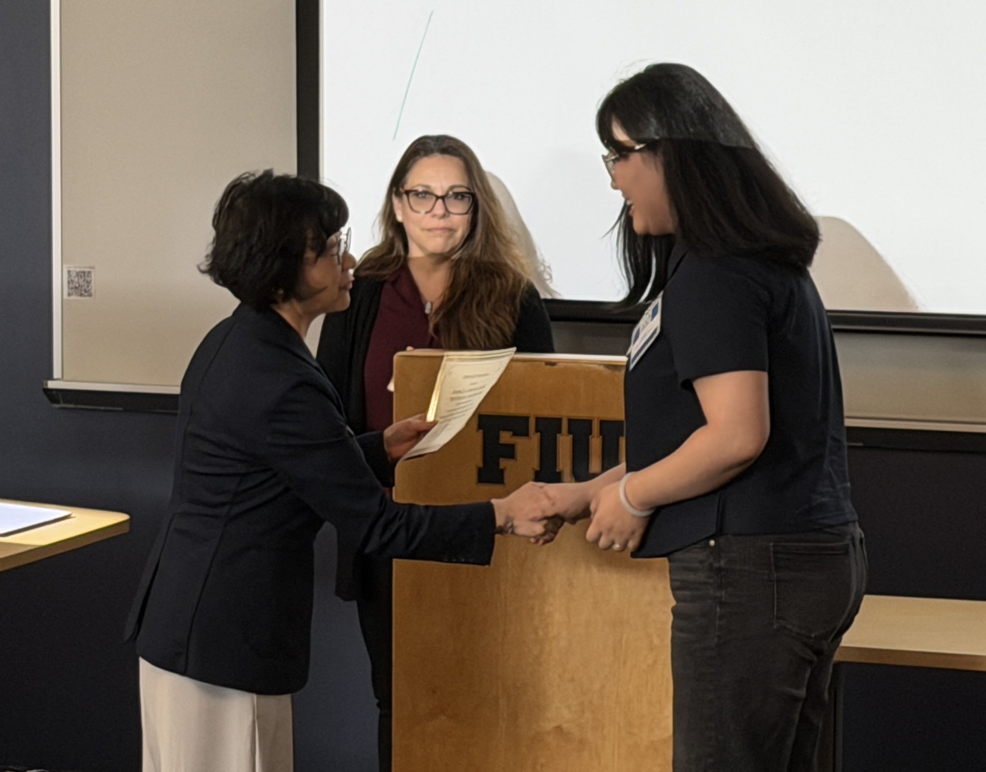 Jingwei Gu receiving award