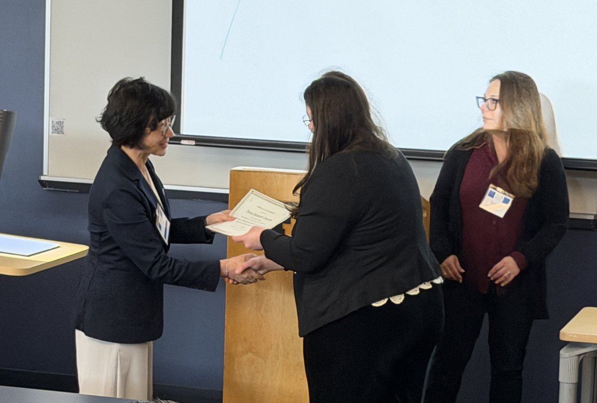 Diana Dancea receiving award