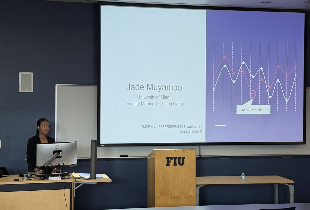 Jade Muyambo receiving award